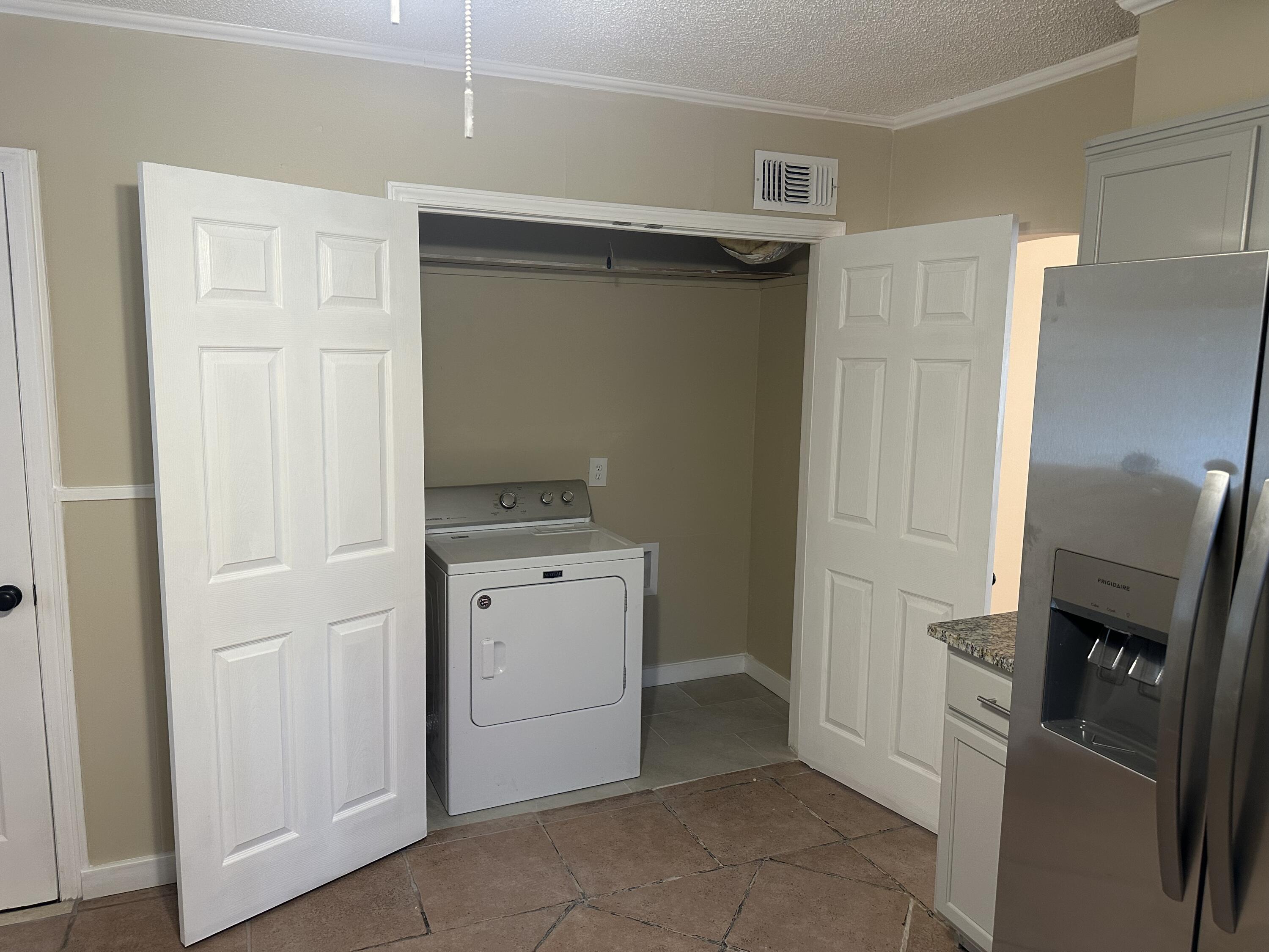 1510 28th Street Lubbock, TX 79411 - Photo 23 of 46 a room with a washer and dryer
