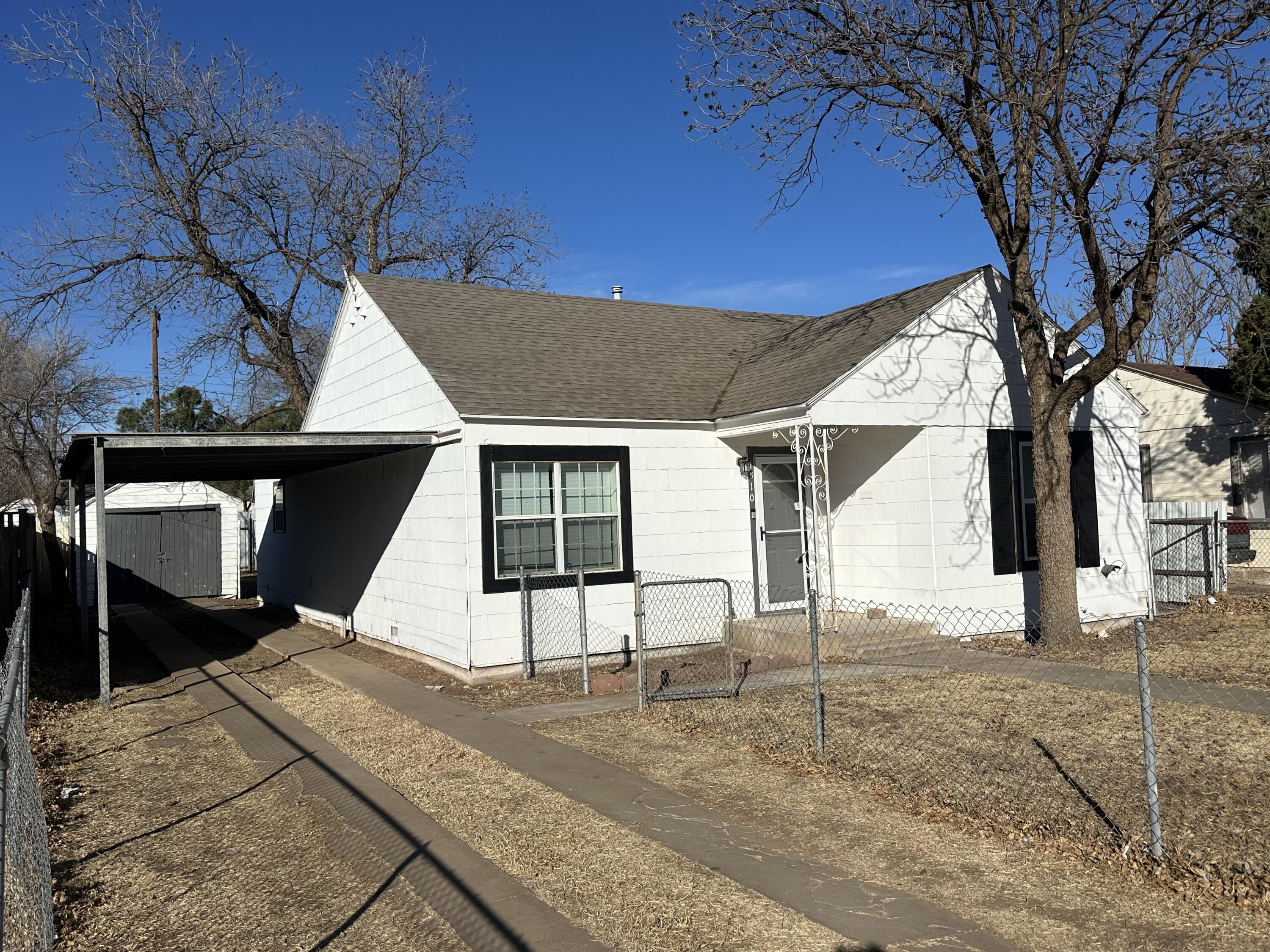 1510 28th Street Lubbock, TX 79411 - Photo 46 of 46 a view of a house with a yard