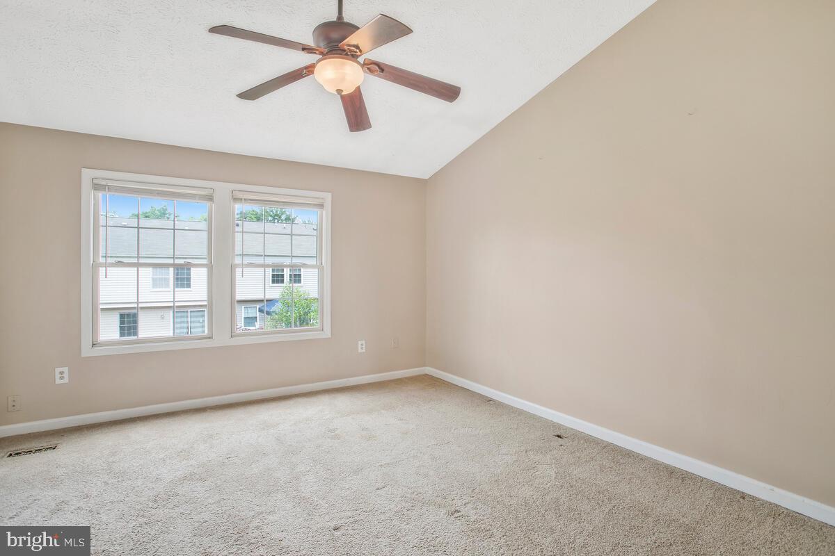 2402 Beechnut Place Odenton, MD 21113 - Photo 19 of 40 Primary Bedroom with vaulted ceiling