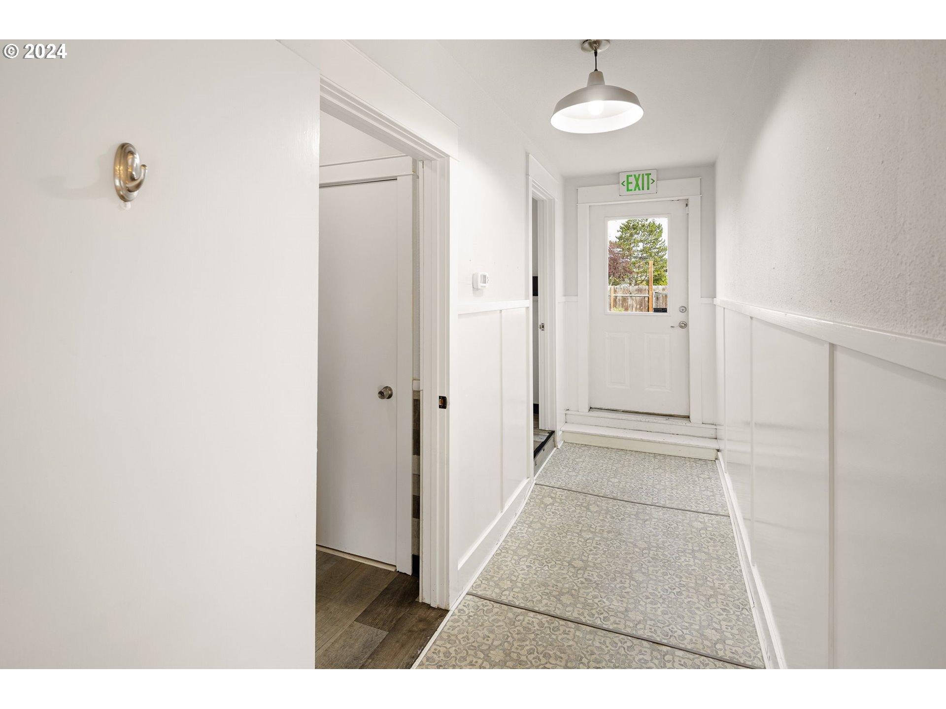155 East Main Street Lowell, OR 97452 - Photo 11 of 17 a view of an entryway with wooden floor