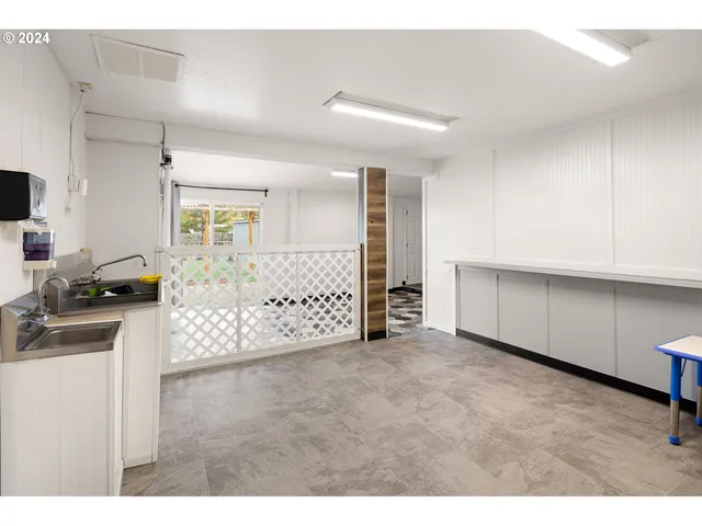 a view of kitchen and sink