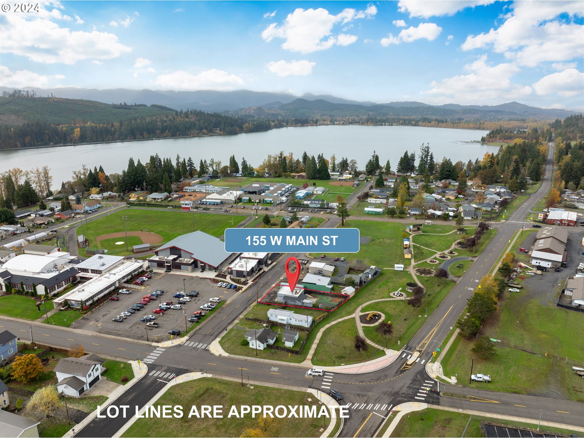155 East Main Street Lowell, OR 97452 - Photo 5 of 17 an aerial view of a house with a ocean view