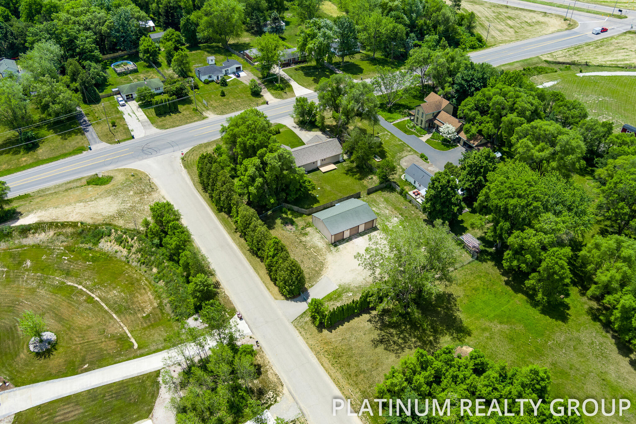 1307 10 Mile Road Northwest Sparta, MI 49345 - Photo 11 of 39 Aerial Showing Pole Barn Driveway