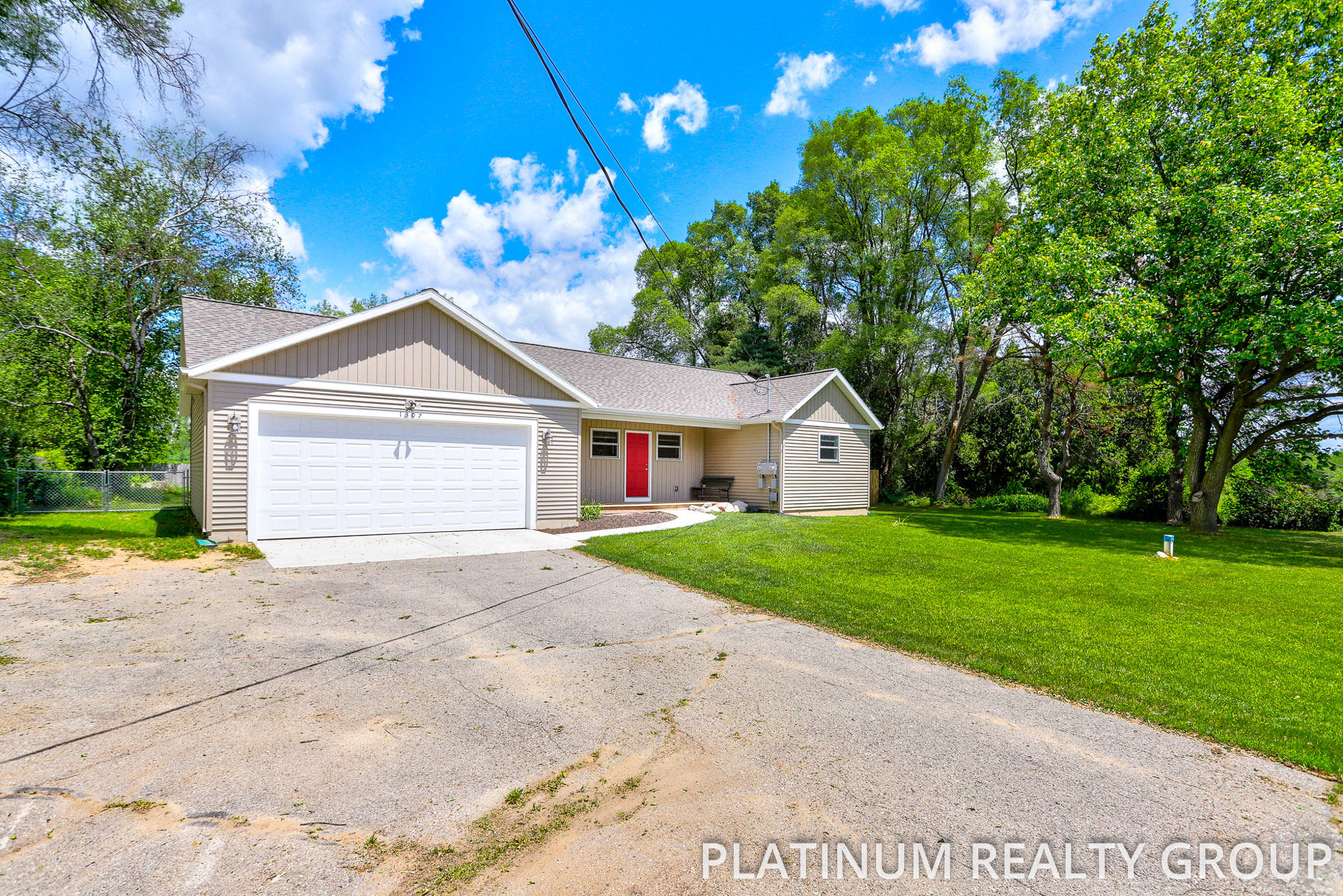 1307 10 Mile Road Northwest Sparta, MI 49345 - Photo 2 of 39 Front/Side