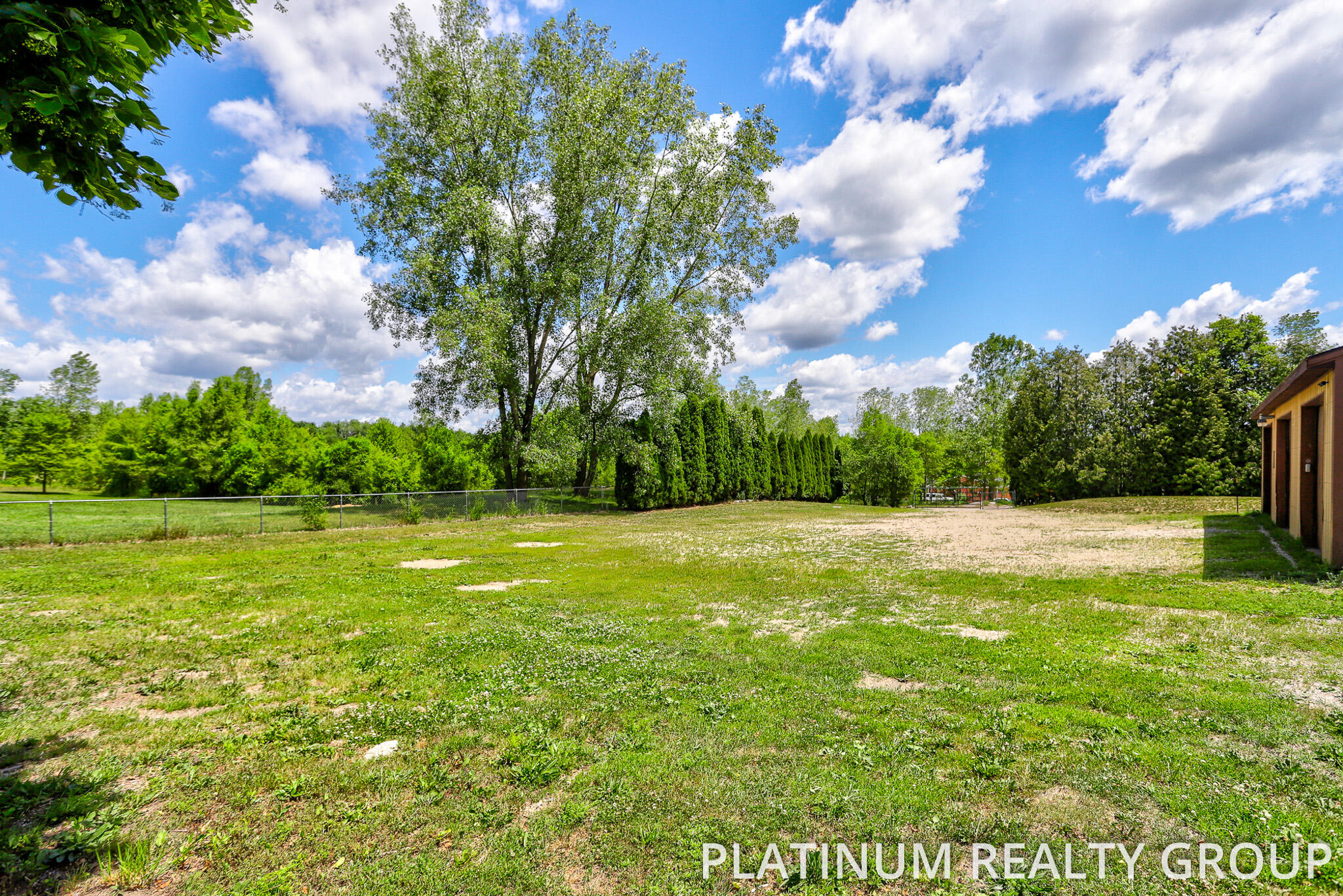 1307 10 Mile Road Northwest Sparta, MI 49345 - Photo 8 of 39 Backyard by Pole Barn