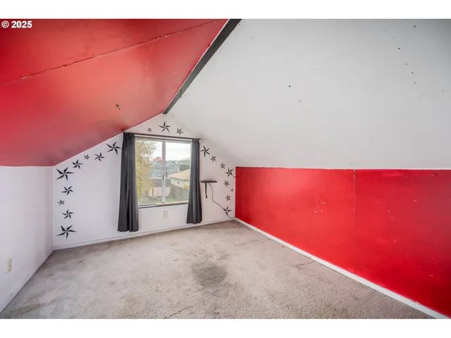 a view of an empty room with window