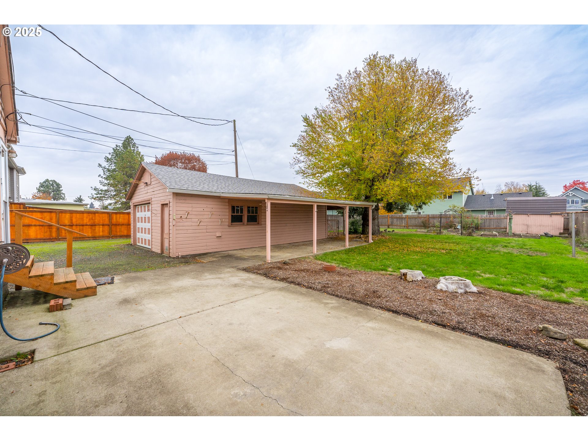 505 Broad Street South Monmouth, OR 97361 - Photo 17 of 28 a front view of a house with a yard and garage