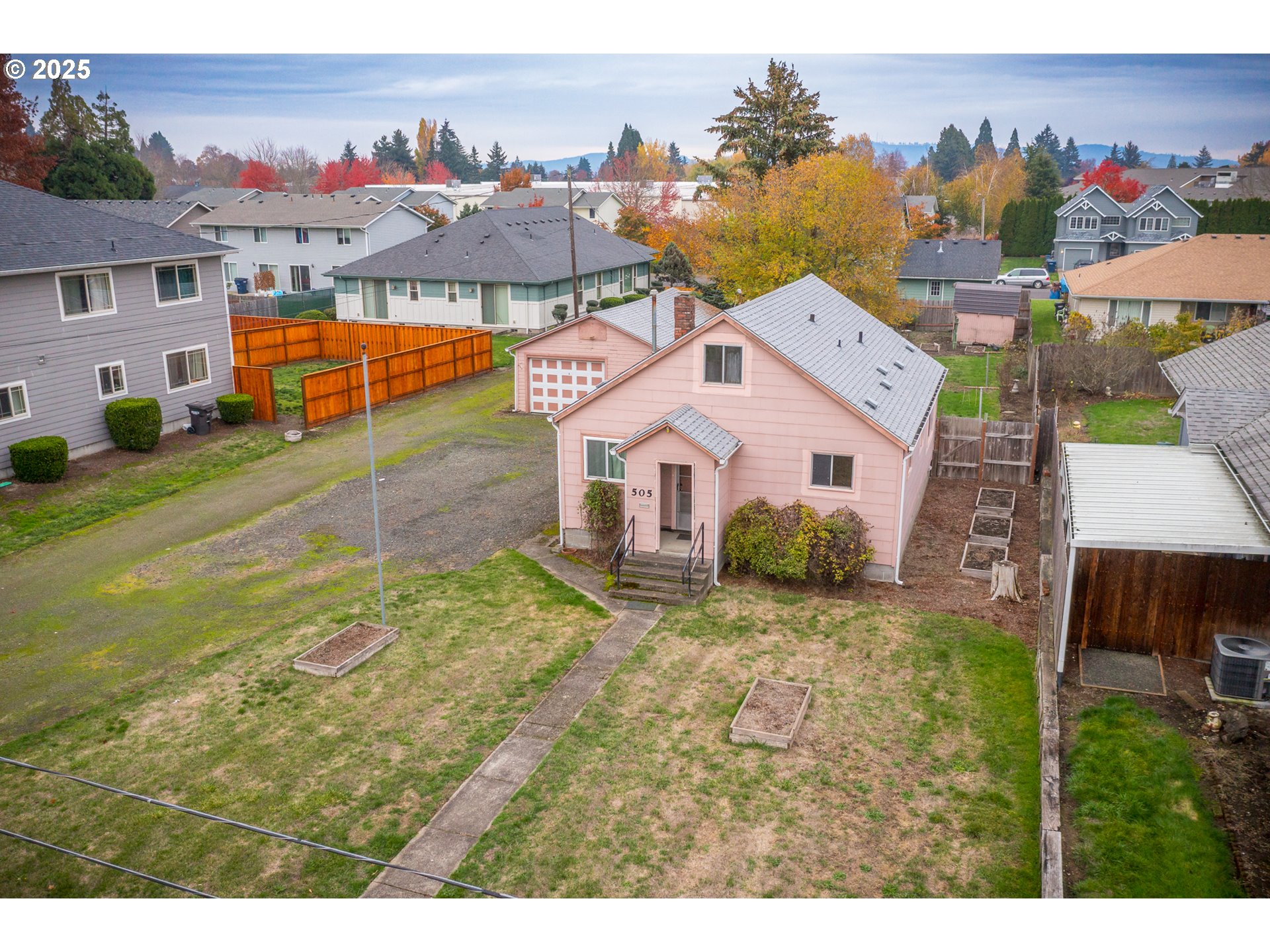 505 Broad Street South Monmouth, OR 97361 - Photo 23 of 28 a view of a house with a yard