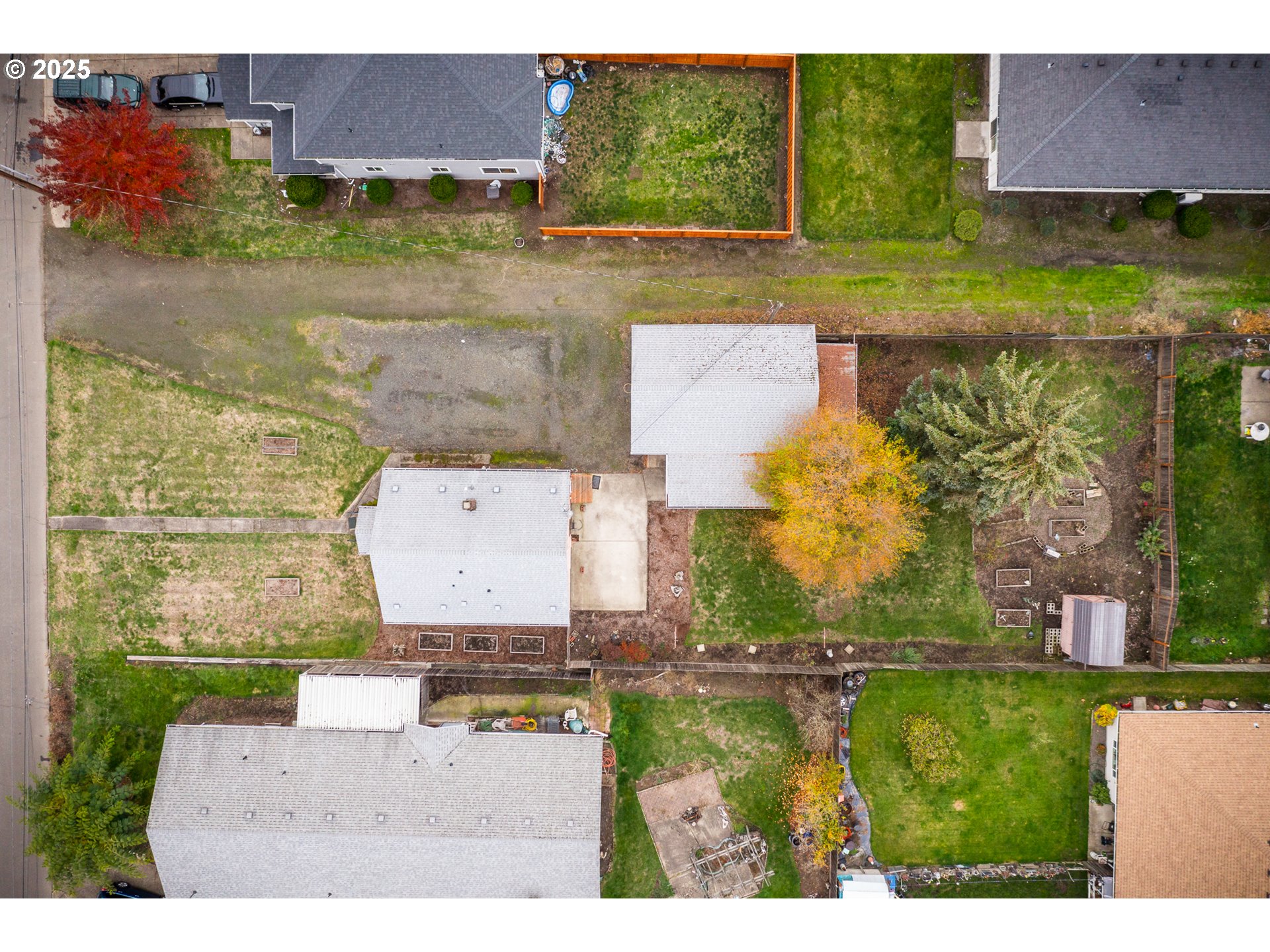 505 Broad Street South Monmouth, OR 97361 - Photo 28 of 28 an aerial view of residential houses with outdoor space and swimming pool