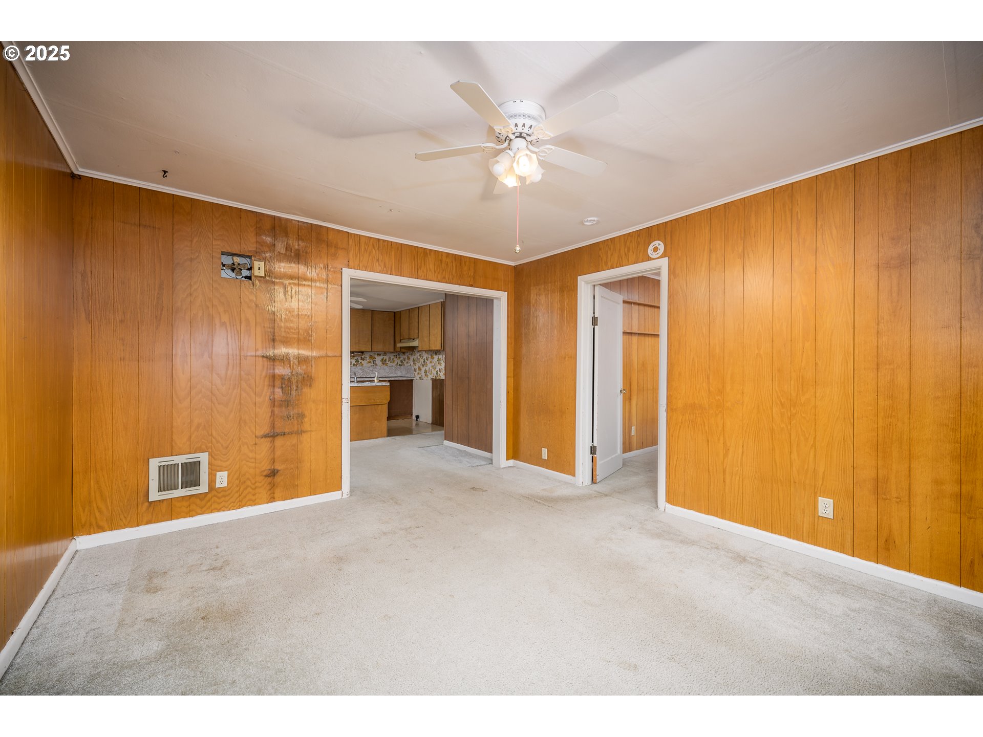 505 Broad Street South Monmouth, OR 97361 - Photo 7 of 28 a view of a livingroom with a chandelier fan