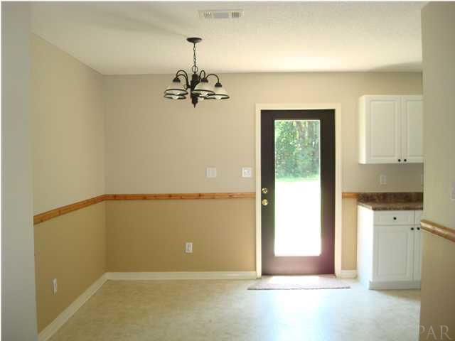 4208 Galt City Road Milton, FL 32583 - Photo 7 of 21 Kitchen has a window that overlooks the large, fenced backyard!