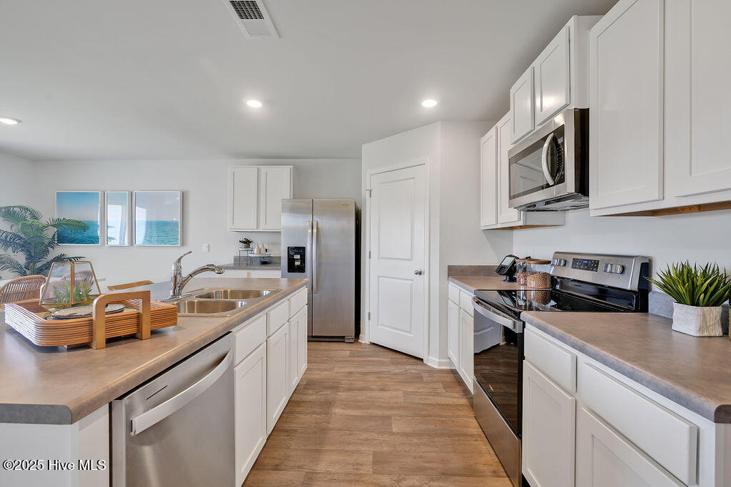 5313 Areca Road, Unit LOT 427 Castle Hayne, NC 28429 - Photo 13 of 45 The photos you see here are for illustration purposes only, interior and exterior features, options, colors and selections will vary from the homes as built.