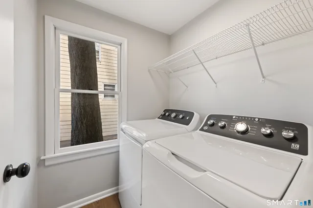 a utility room with dryer and washer