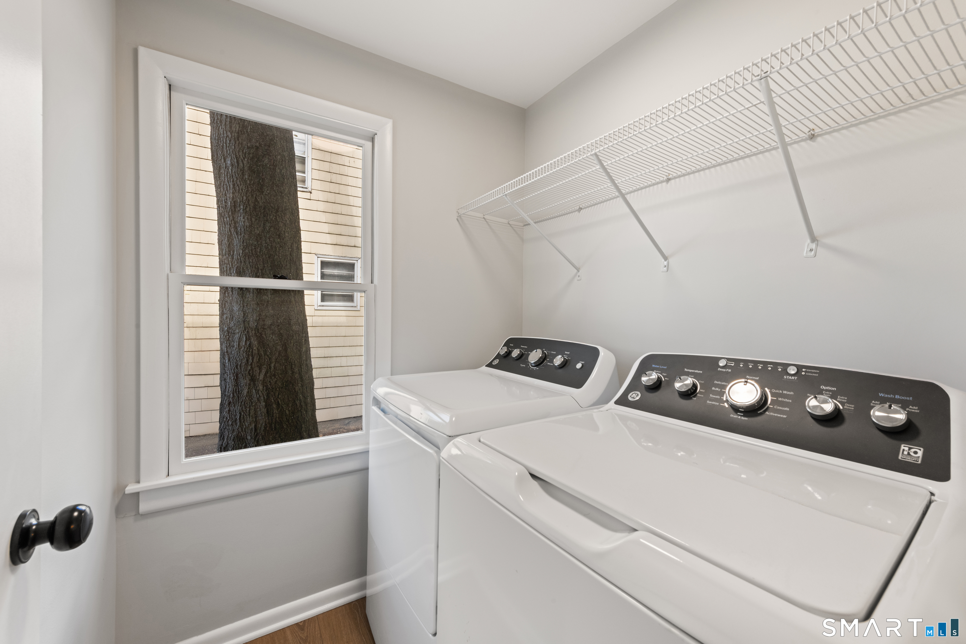 3 Edgewood Street Norwalk, CT 06854 - Photo 19 of 23 a utility room with dryer and washer