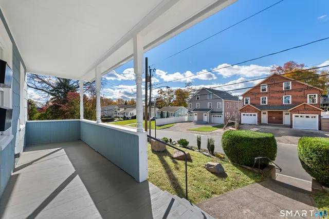 a view of balcony with a potted plant