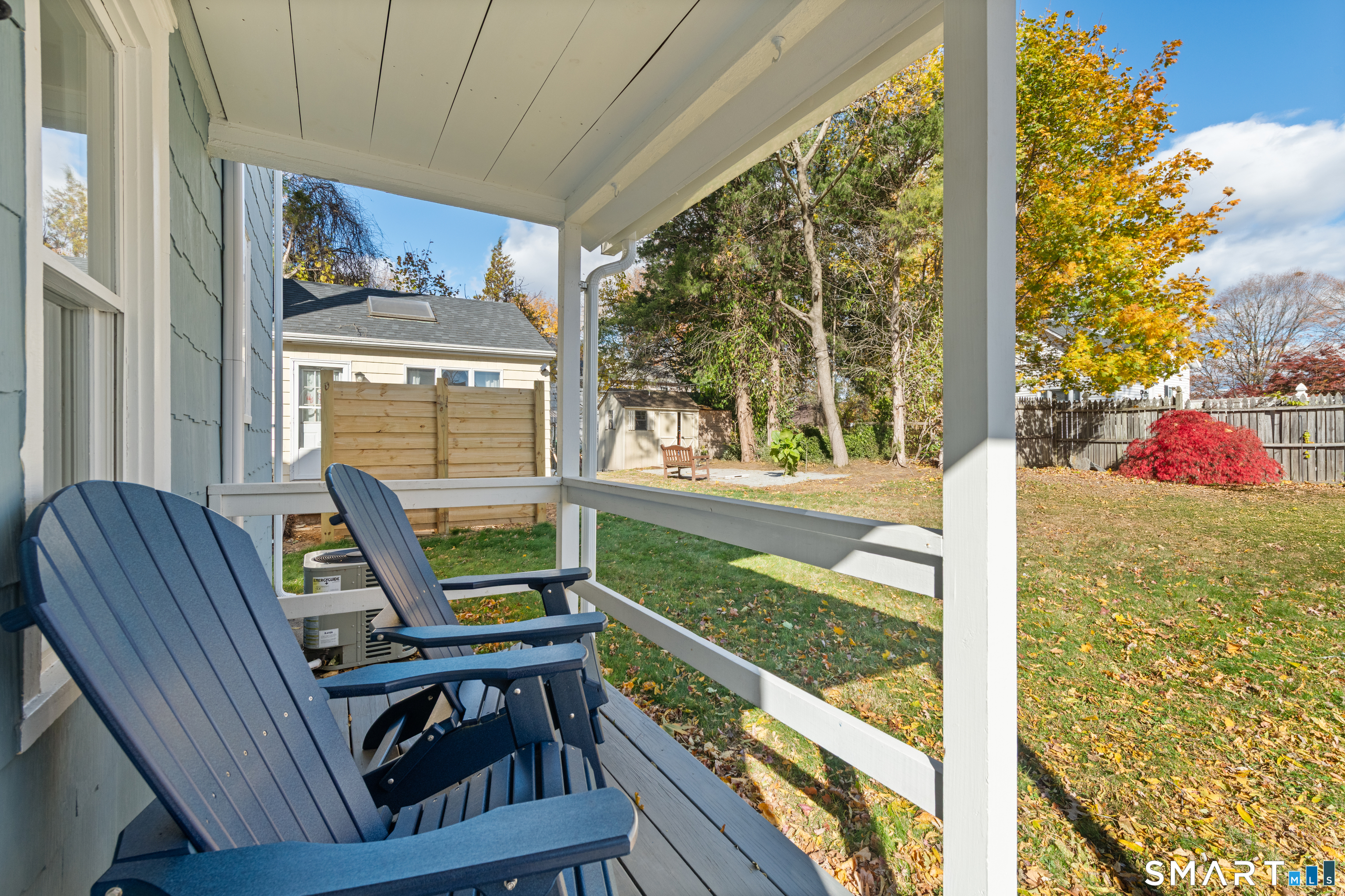 3 Edgewood Street Norwalk, CT 06854 - Photo 7 of 23 a view of two chairs in the balcony