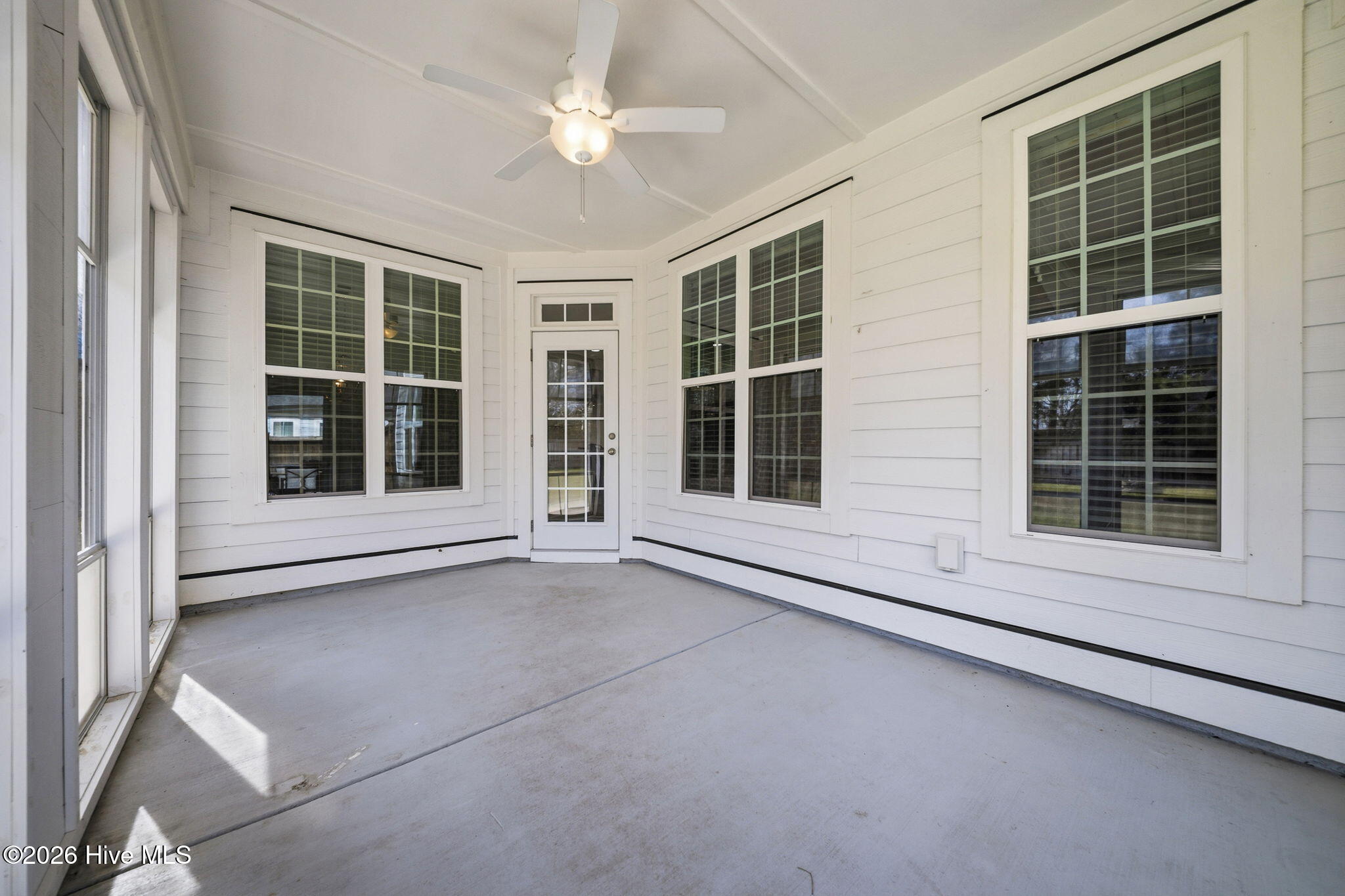 166 Camden Trail Hampstead, NC 28443 - Photo 14 of 42 Enclosed Patio from Kitchen Entrance