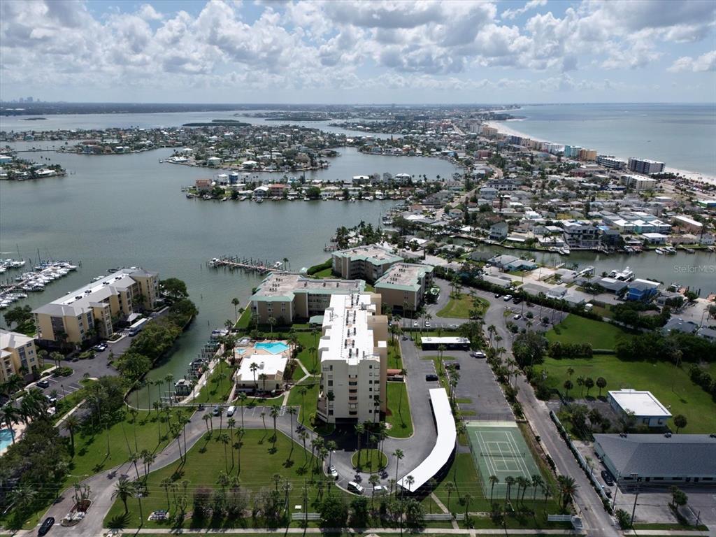 401 150th Avenue, Unit 251 Madeira Beach, FL 33708 - Photo 36 of 45 an aerial view of a city with lake view