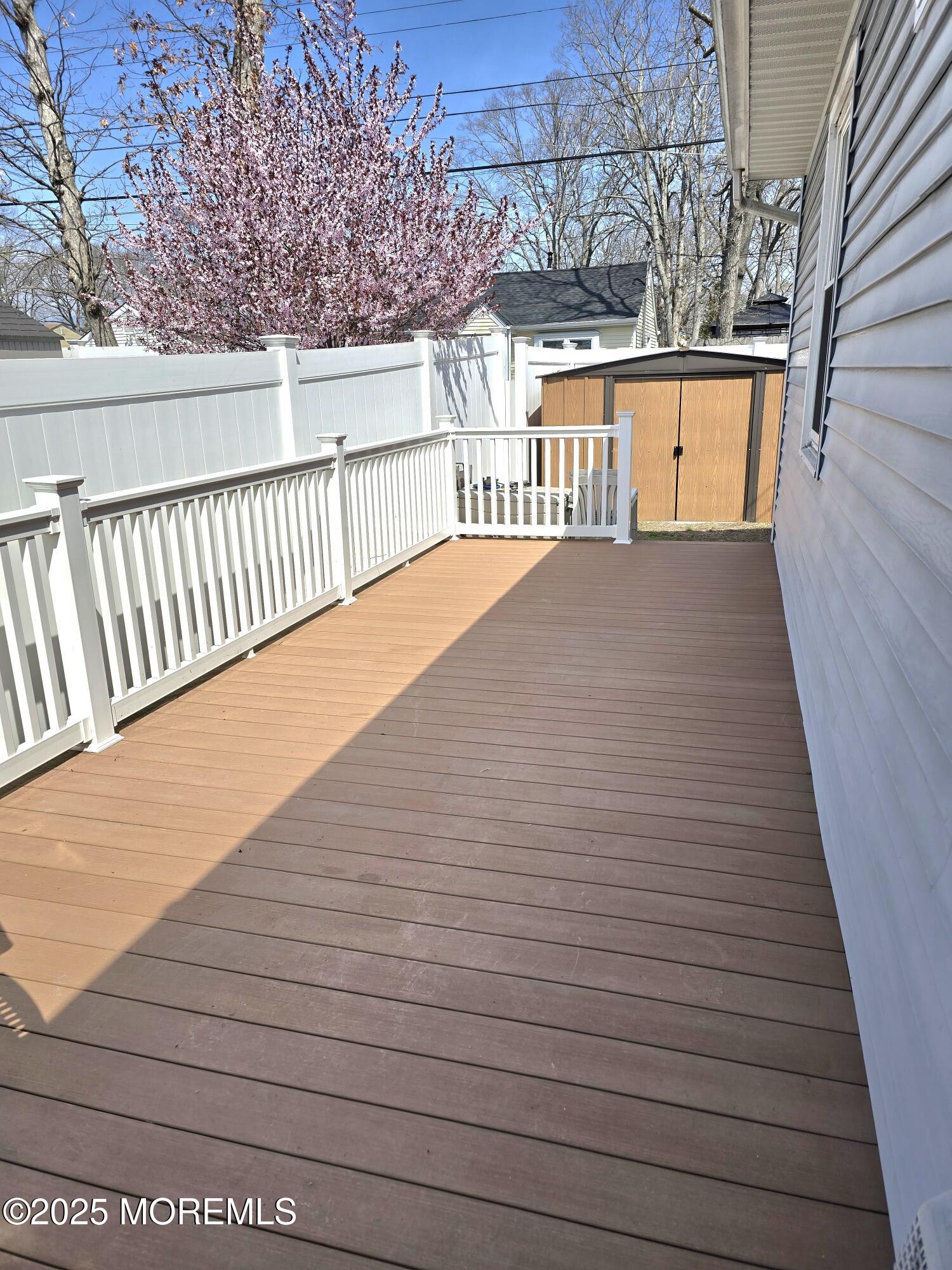 2126 Wainwright Road Toms River, NJ 08753 - Photo 23 of 28 a view of balcony with wooden floor