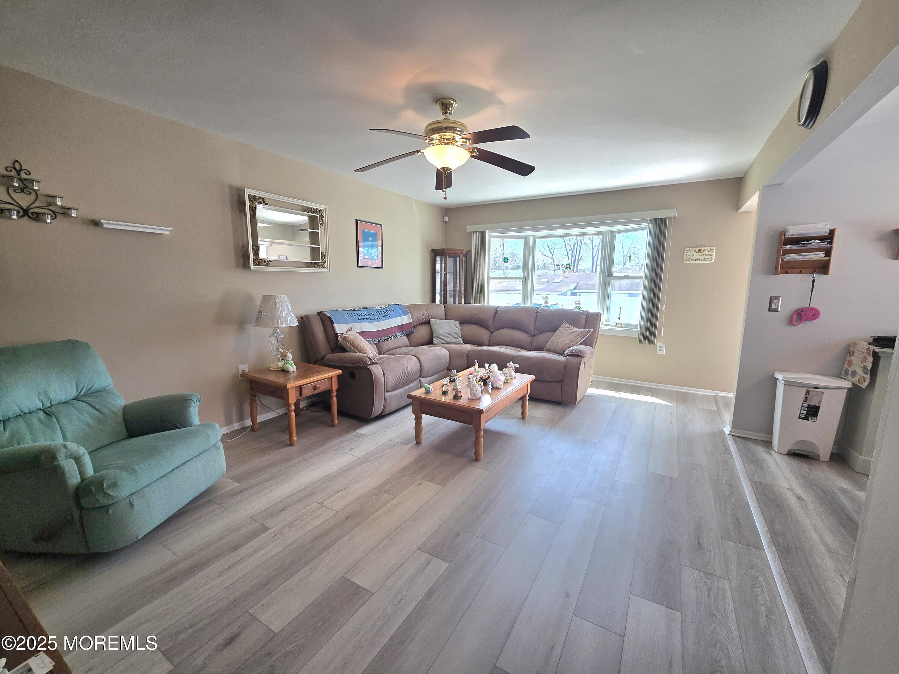 2126 Wainwright Road Toms River, NJ 08753 - Photo 7 of 28 a living room with furniture and a window
