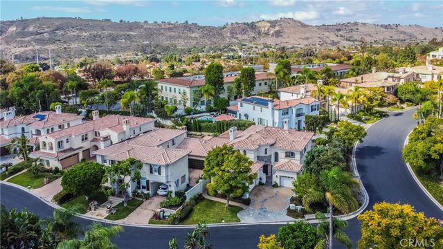 a living room with furniture a window and a fireplace