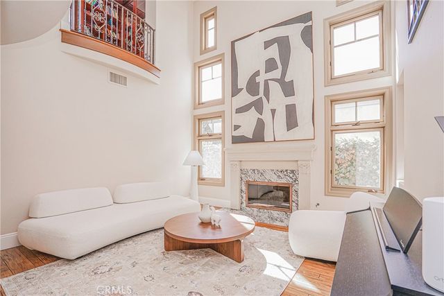 a kitchen with a sink stove and wooden cabinets