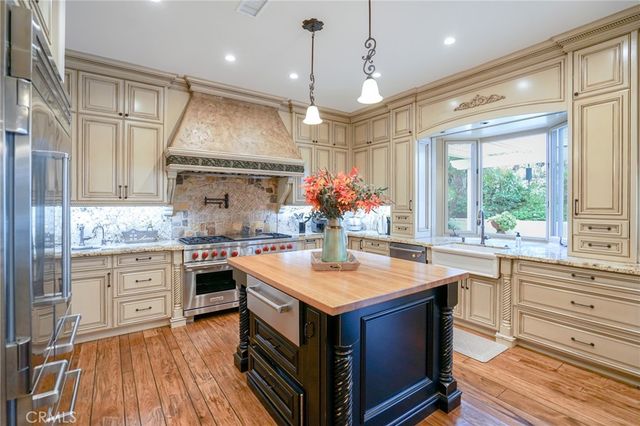 a bed room with a bed and a fireplace