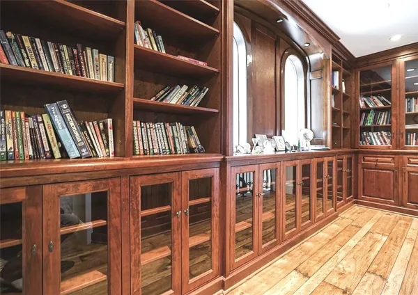 a bathroom with a sink a mirror and a vanity