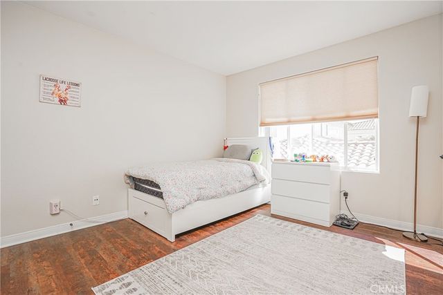 a bathroom with a toilet a sink and shower