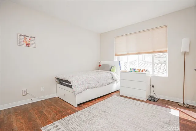 a bathroom with a toilet a sink and shower