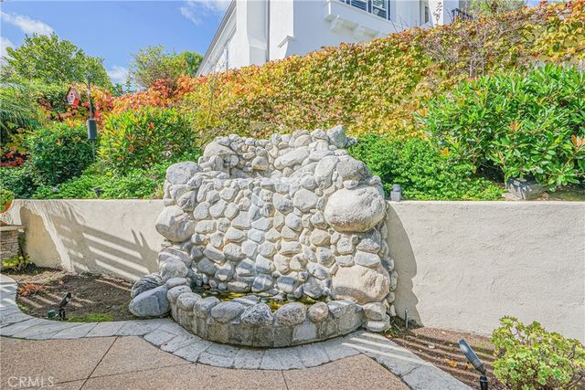 a utility room with cabinets washer and dryer