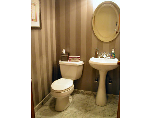 7 Ida Road Marblehead, MA 01945 - Photo 11 of 16 a bathroom with a toilet sink and mirror