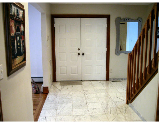 7 Ida Road Marblehead, MA 01945 - Photo 4 of 16 a view of a livingroom with a staircase