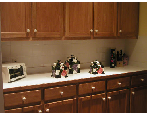 7 Ida Road Marblehead, MA 01945 - Photo 9 of 16 a kitchen with a sink dishwasher and cabinets