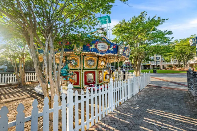 a view of a house with swimming pool and a yard