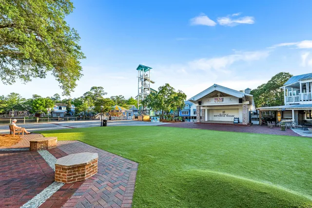 a view of a dinning table and chairs in the patio