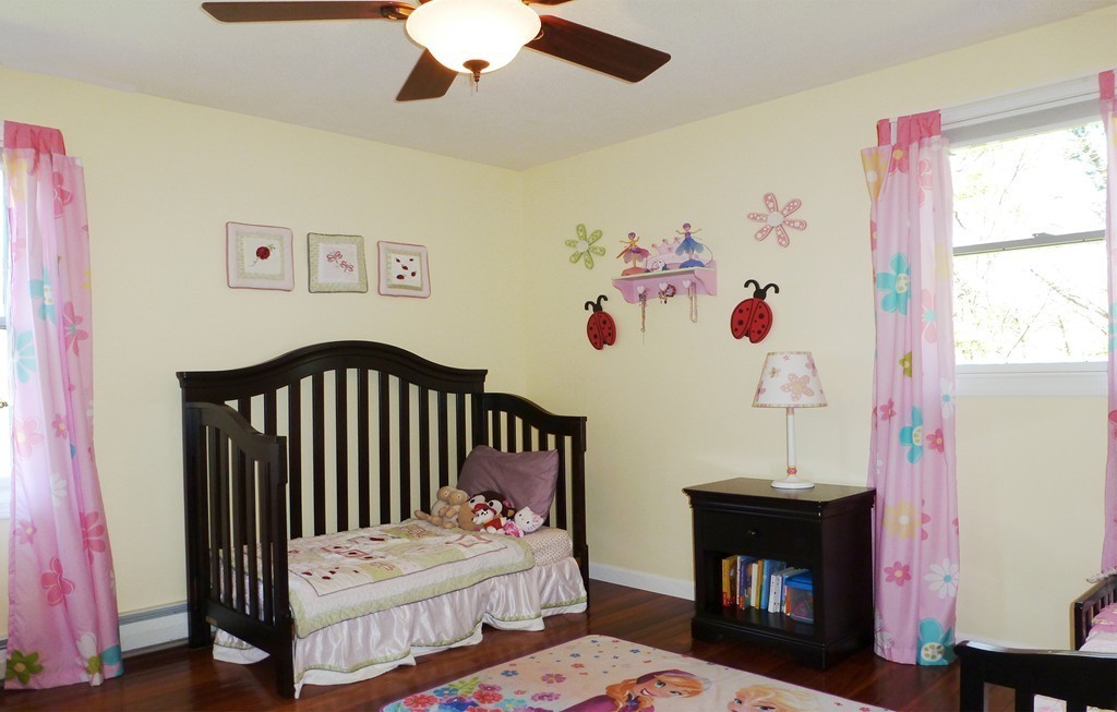 15 Old Wales Road Monson, MA 01057 - Photo 17 of 24 a bedroom with a bed and wooden floor