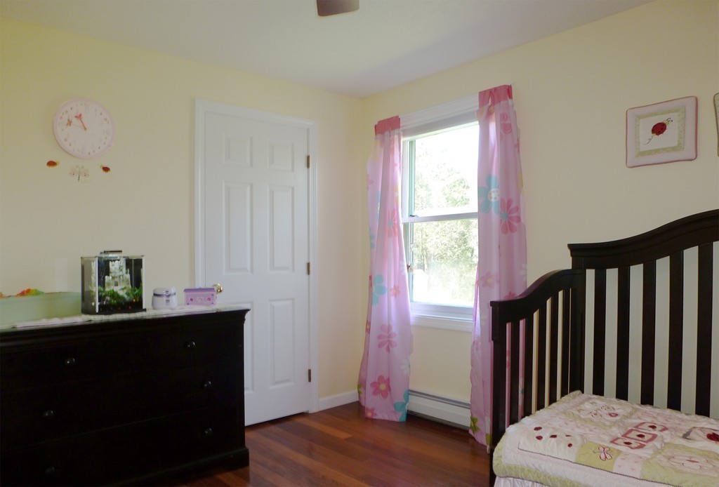 15 Old Wales Road Monson, MA 01057 - Photo 19 of 24 a view of a bedroom with a window and wooden floor