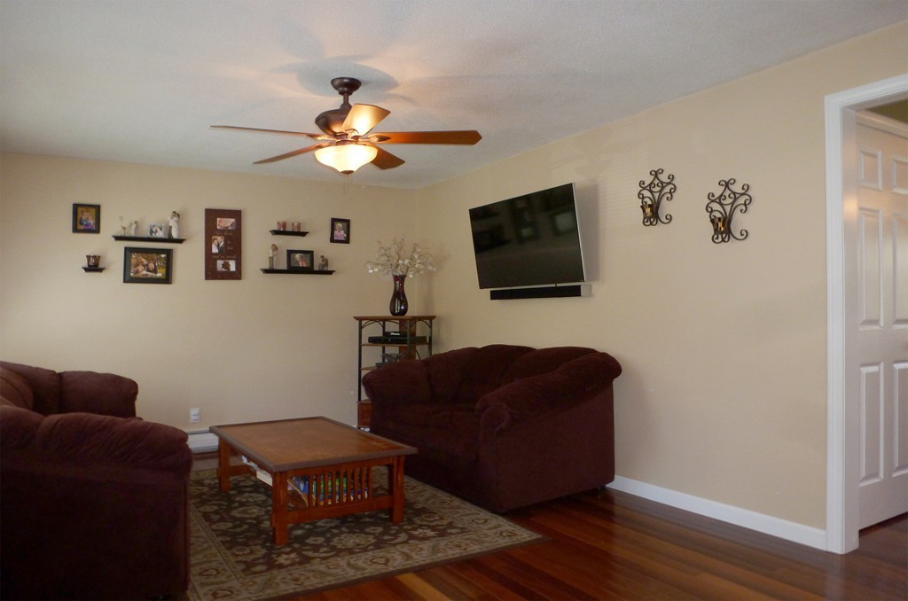 15 Old Wales Road Monson, MA 01057 - Photo 9 of 24 a living room with furniture a flat screen tv and a window