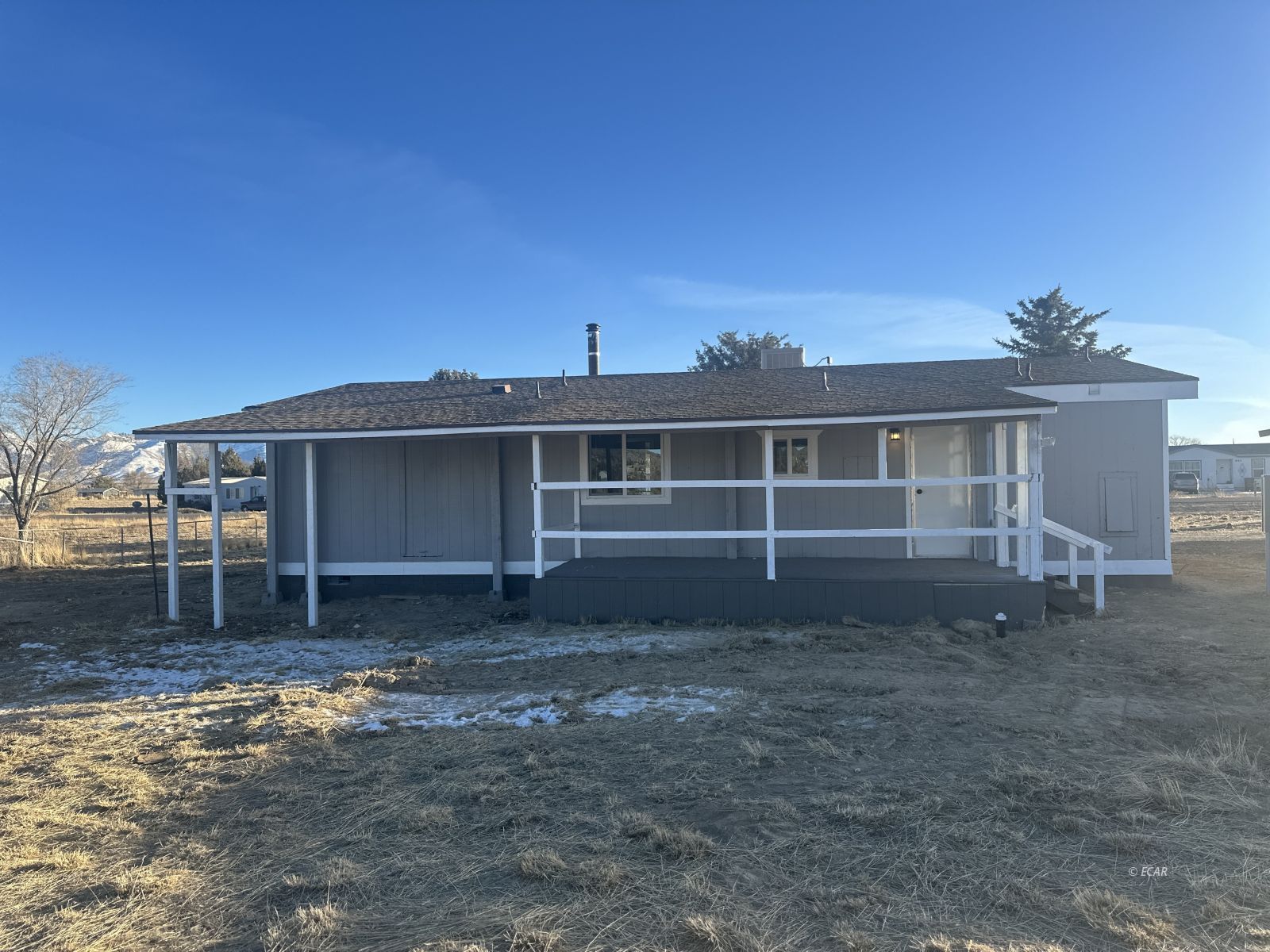 940 Spring Valley Parkway Spring Creek, NV 89815 - Photo 22 of 25 a view of a house with a yard