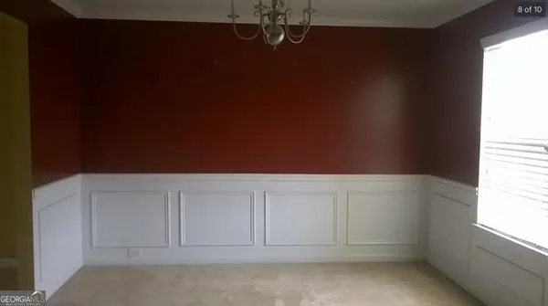 a kitchen with a sink and a microwave