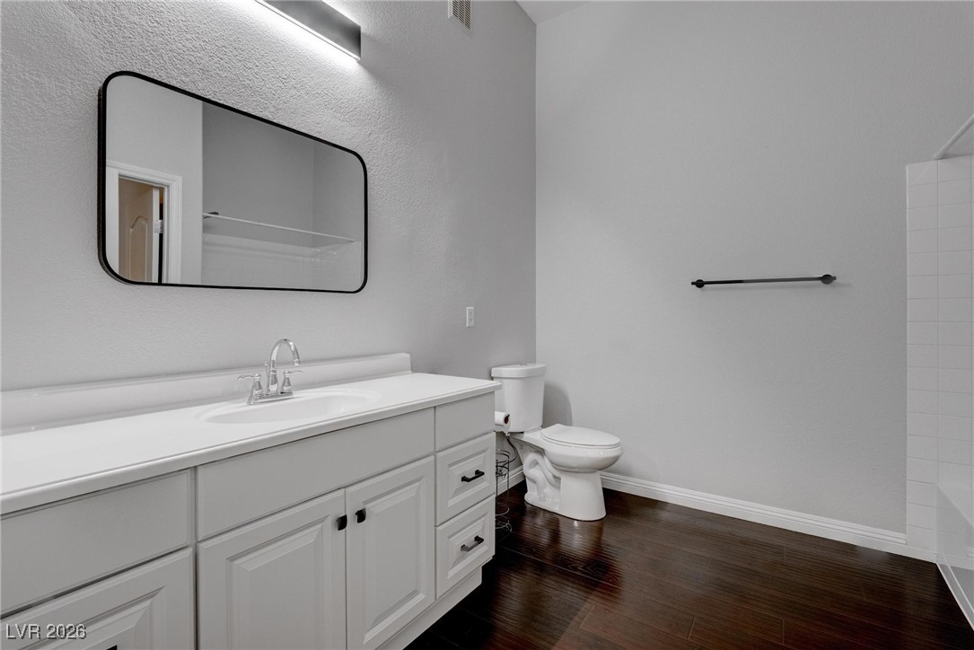 2305 West Horizon Ridge Parkway, Unit 3921 Henderson, NV 89052 - Photo 12 of 31 Full bathroom with vanity and wood finished floors