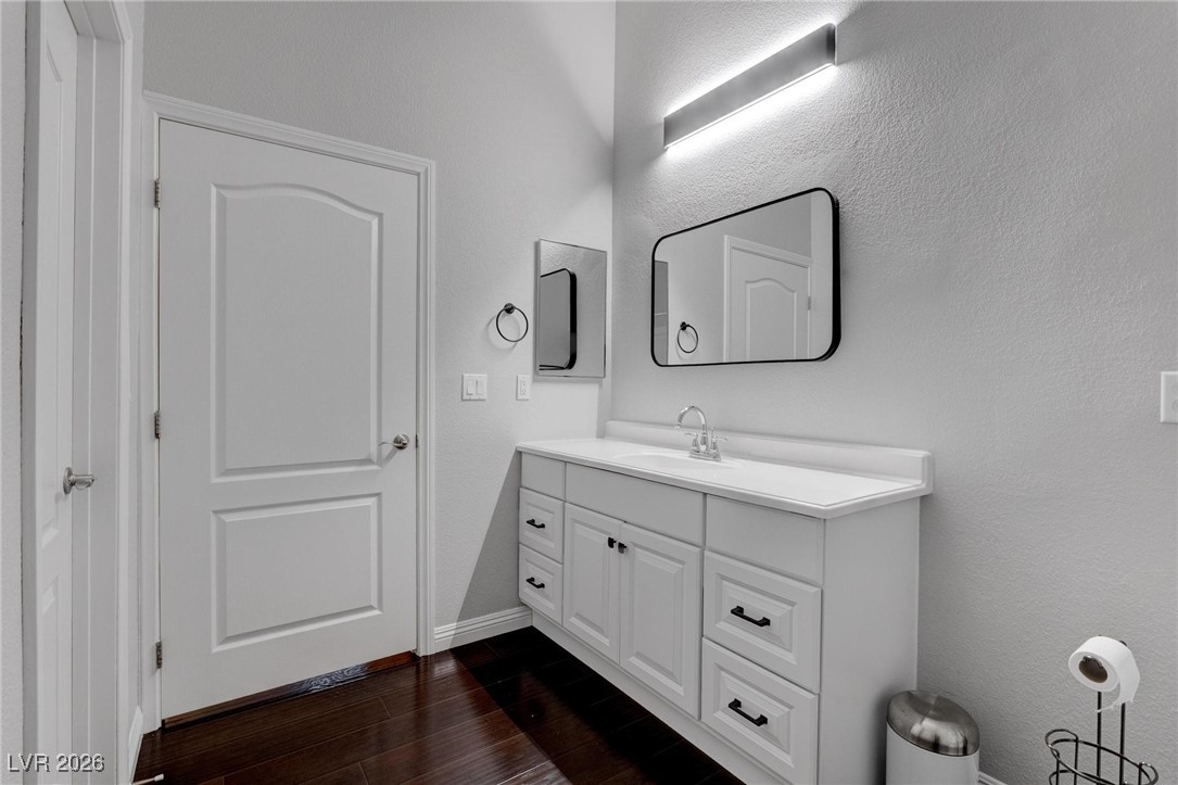 2305 West Horizon Ridge Parkway, Unit 3921 Henderson, NV 89052 - Photo 13 of 31 Bathroom with vanity and wood finished floors