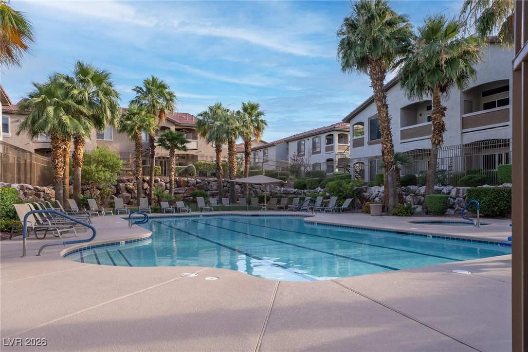 2305 West Horizon Ridge Parkway, Unit 3921 Henderson, NV 89052 - Photo 30 of 31 Community pool featuring a patio and a hot tub
