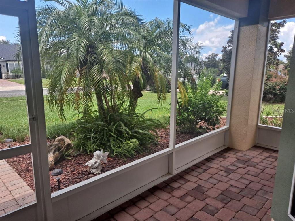 13534 Biscayne Grove Lane Grand Island, FL 32735 - Photo 12 of 12 a view of a garden from a balcony