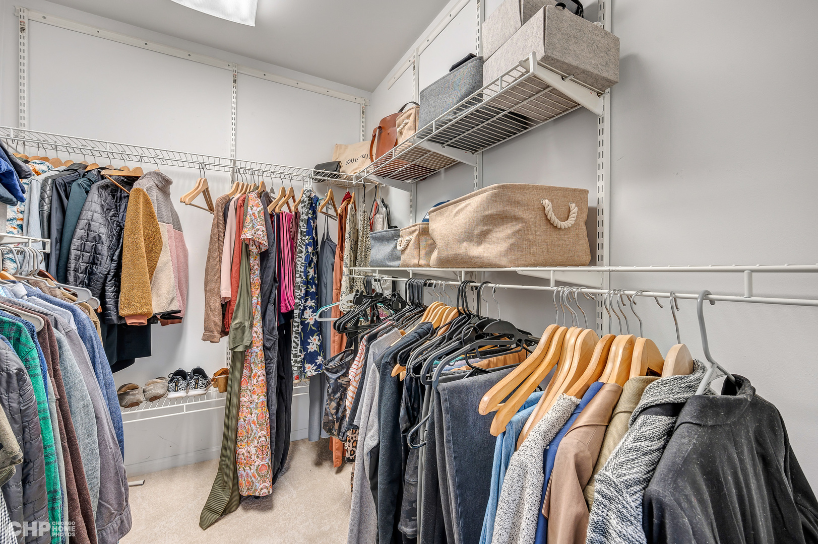 316 Nuttall Road Riverside, IL 60546 - Photo 20 of 40 a view of walk in closet with clothes and shoes