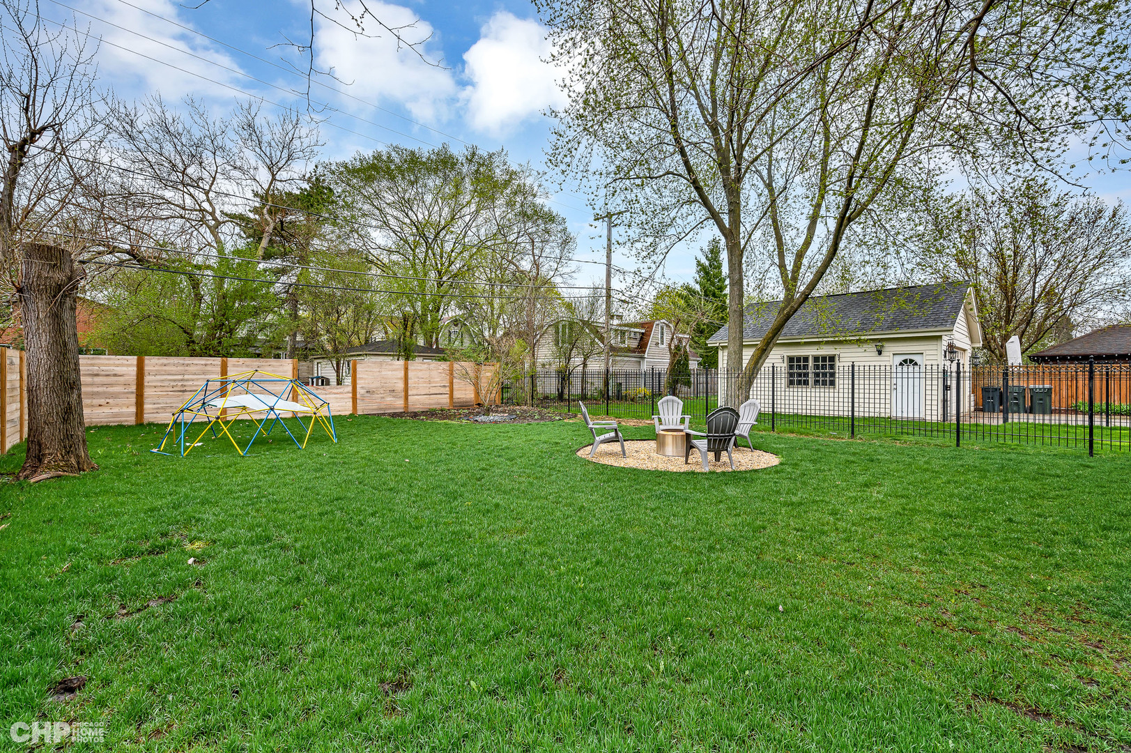 316 Nuttall Road Riverside, IL 60546 - Photo 33 of 40 a view of a house with backyard and a tree
