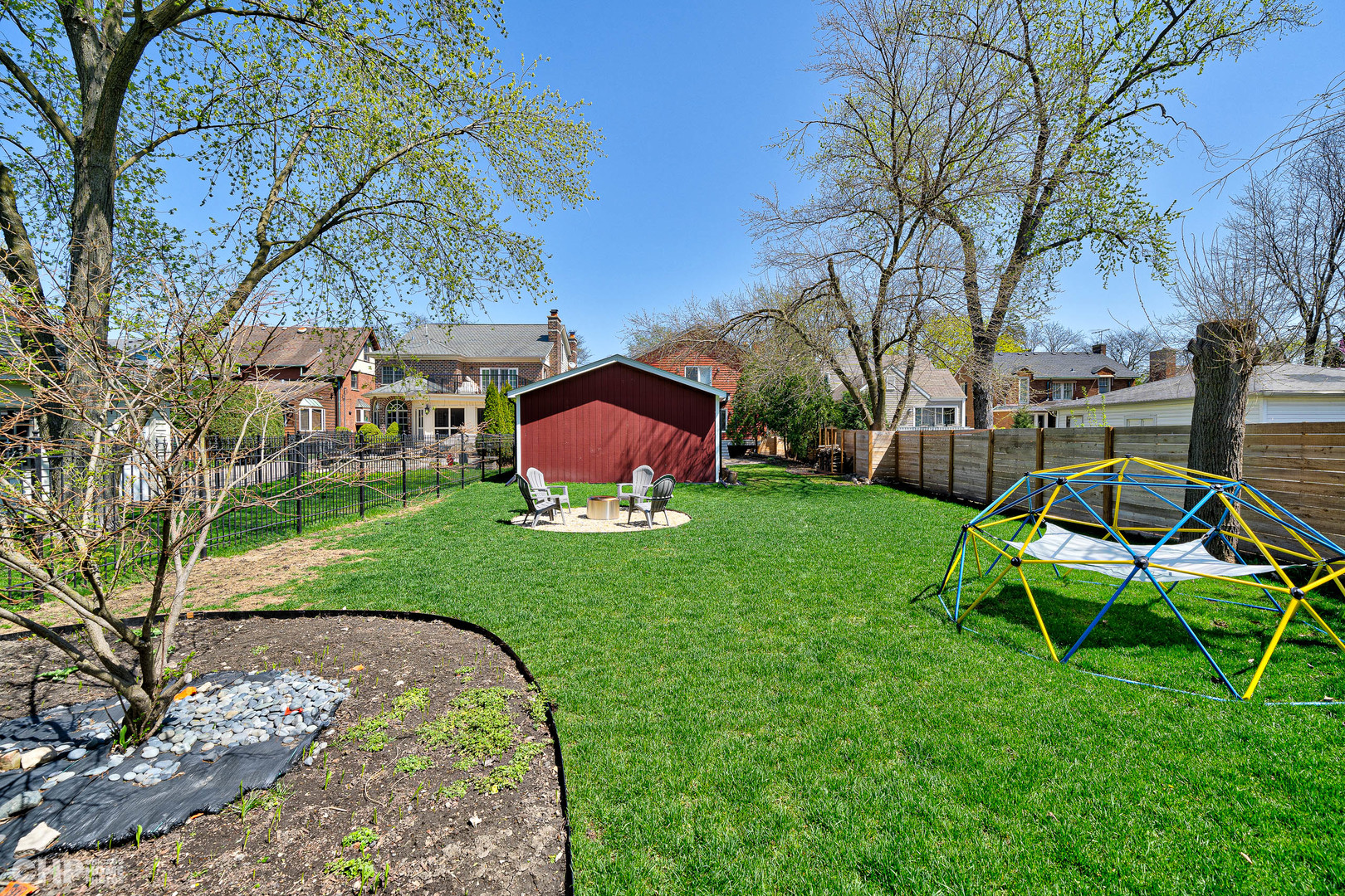 316 Nuttall Road Riverside, IL 60546 - Photo 34 of 40 a view of a backyard with table and chairs under a large tree