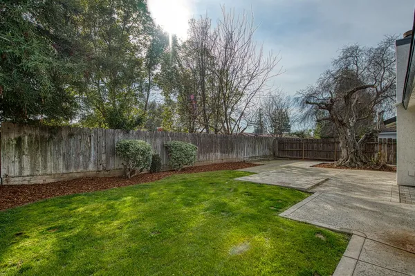 a view of a backyard with green space