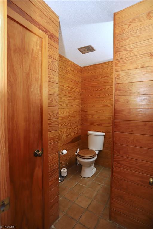 4611 East Perquimans Road Greensboro, NC 27407 - Photo 38 of 49 First floor half bath